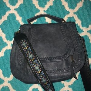 Crossbody with guitar strap
